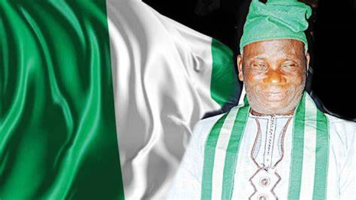 Who designed the Nigerian coat of arms? Where was Taiwo Akinkunmi born?